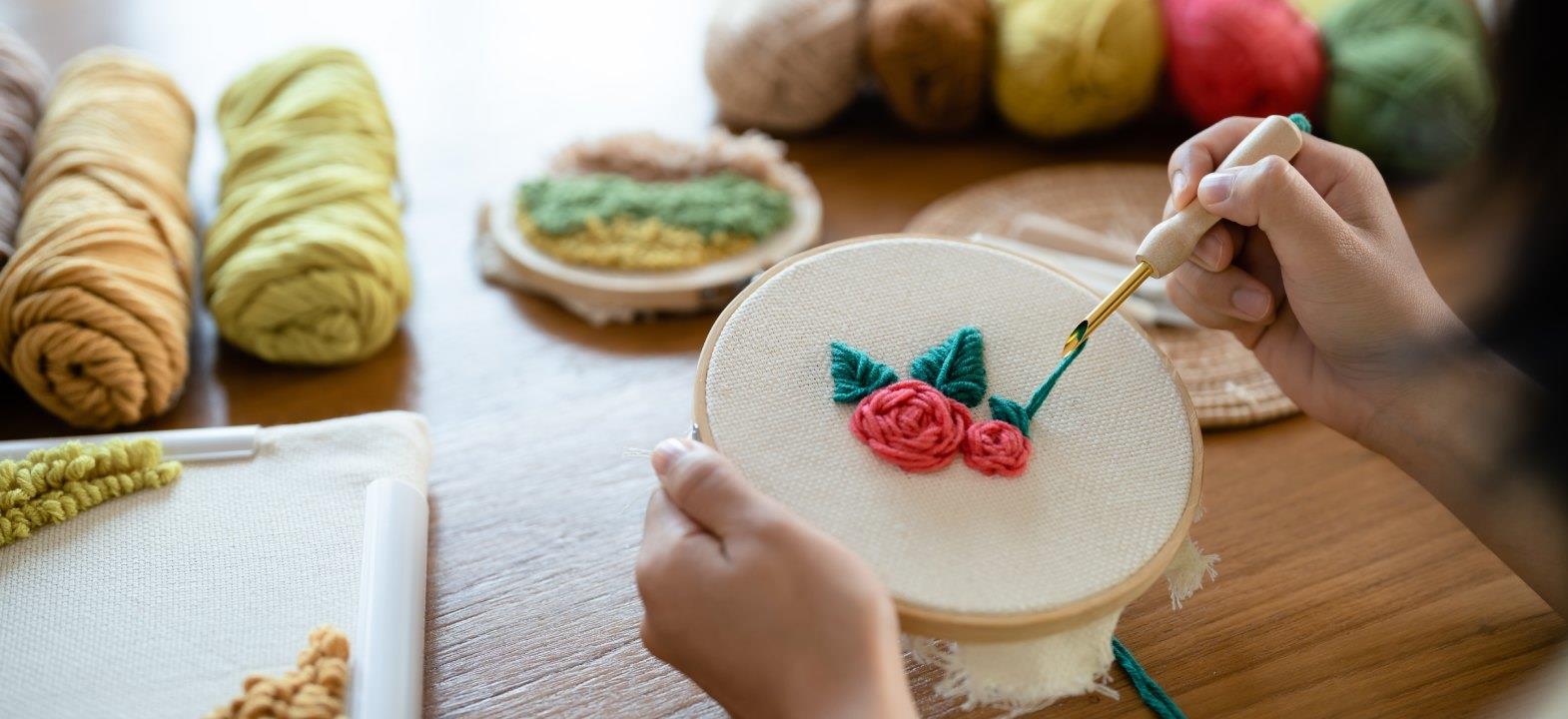 Embroidery is the Embellishment of Cloth with Designs